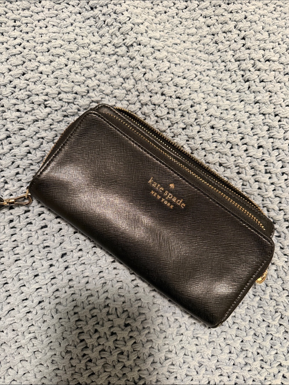 kate spade black leather zip-around wristlet with gold hardware